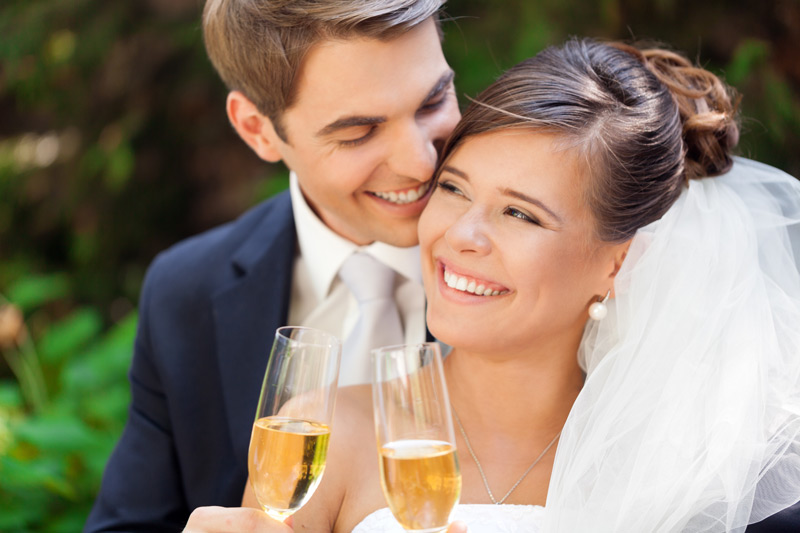Bride and groom toasting
